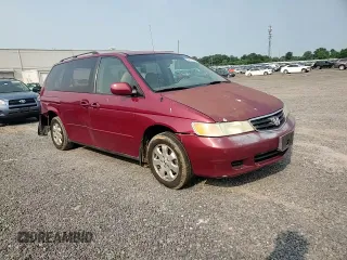 2004 Honda Odyssey EX-L with VIN 5FNRL18024B008617, listed as a Copart auction lot 58831435 with Not provided miles and Salvage title. Bid and sale history available at DreamBid. Image 14.