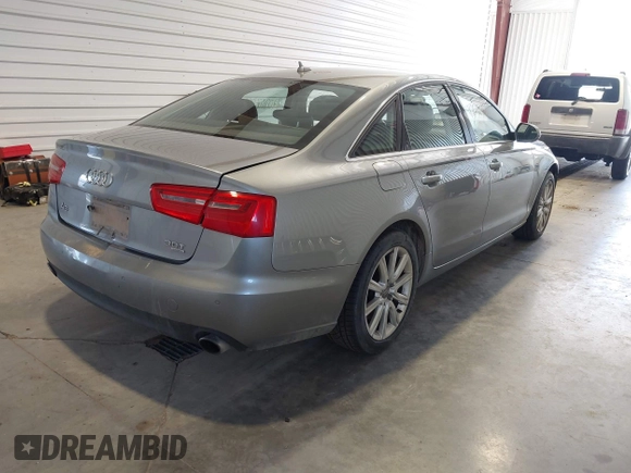 2013 Audi A6 Premium Plus z VIN WAUGGAFC3DN066310, wystawiony jako IAAI lot #42020702 z przebiegiem 195 939 mil mil oraz . Historia ofert i sprzedaży dostępna na DreamBid. Obrazek 4.