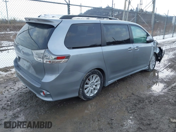 2013 Toyota Sienna SE with VIN 5TDXK3DC0DS354540, listed as a IAAI auction lot 41445501 with 238,814 mi miles and . Bid and sale history available at DreamBid. Image 4.