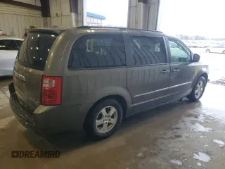 2010 Dodge Grand Caravan SXT with VIN 2D4RN5D1XAR268587, listed as a Copart auction lot 55072485 with 322,312 mi miles and Non Repairable. Bid and sale history available at DreamBid. Image 3.