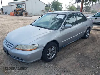 2002 Honda Accord SE z VIN JHMCG66802C027742, wystawiony jako IAAI lot #42373110 z przebiegiem 141 167 mil mil oraz . Historia ofert i sprzedaży dostępna na DreamBid. Obrazek 2.