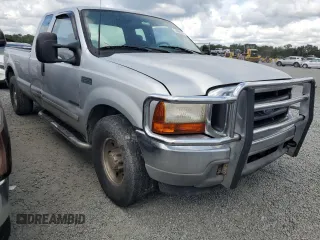 2001 Ford Super Duty F-250 XL with VIN 1FTNX20F61EB23095, listed as a Copart auction lot 74060304 with 458,656 mi miles and Salvage Title. Bid and sale history available at carsss.com. Image 4.