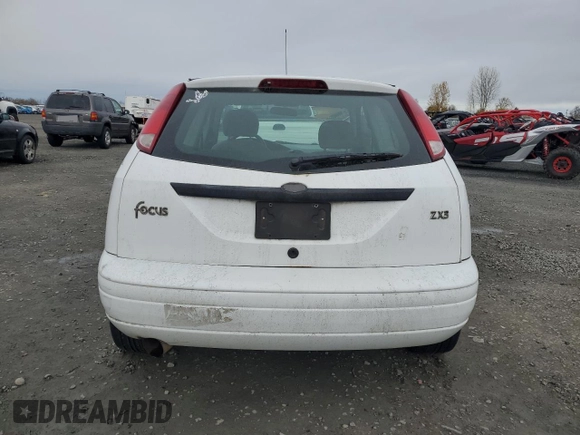 2003 Ford Focus ZX3 with VIN 3FAFP31Z83R182271, listed as a Copart auction lot 82415004 with 211,193 mi miles and Salvage title. Bid and sale history available at DreamBid. Image 6.
