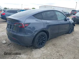 2023 Tesla Model Y Long Range with VIN 7SAYGDEE3PA177437, listed as a IAAI auction lot 41813483 with 17,093 mi miles. Bid and sale history available at carsss.com. Image 4.