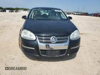 2010 Volkswagen Jetta SE with VIN 3VWRX7AJXAM049320, listed as a Copart auction lot 56142005 with 127,002 mi miles and Salvage title. Bid and sale history available at DreamBid. Image 5.