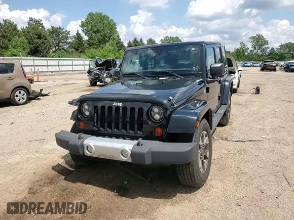 2012 Jeep Wrangler Unlimited Sahara z VIN 1C4HJWEG6CL141988, wystawiony jako Copart lot #61631115 z przebiegiem 140 401 mil mil oraz Szkoda całkowita • Salvage title. Historia ofert i sprzedaży dostępna na DreamBid. Obrazek 13.