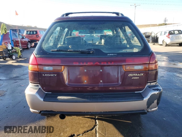 1999 Subaru Legacy Outback with VIN 4S3BG6851X7637598, listed as a Copart auction lot 83469134 with 207,692 mi miles and Salvage title. Bid and sale history available at DreamBid. Image 6.