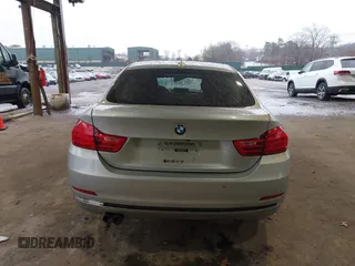 2016 BMW 4 Series 428i xDrive with VIN WBA4C9C56GG139973, listed as a IAAI auction lot 41834506 with 94,587 mi miles and . Bid and sale history available at DreamBid. Image 16.