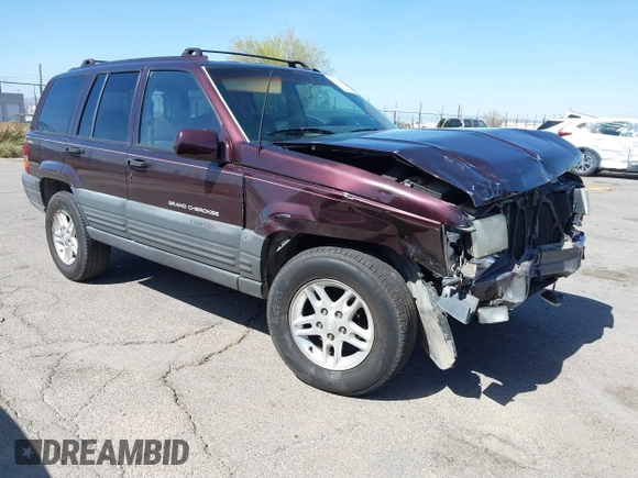 1996 Jeep Grand Cherokee Laredo with VIN 1J4GZ58S3TC391942, listed as a IAAI auction lot 41711778 with 202,765 mi miles. Bid and sale history available at carsss.com. Image 1.