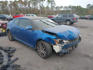 2015 Scion tC with VIN JTKJF5C73F3095758, listed as a IAAI auction lot 41047982 with 187,676 mi miles. Bid and sale history available at carsss.com. Image 1.