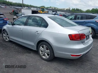 2014 Volkswagen Jetta Hybrid SE с VIN 3VW637AJ9EM284943, выставлен на аукционе IAAI как лот 42567020 с пробегом 164 928 миль миль и . История ставок и продаж доступна на DreamBid. Изображение 3.