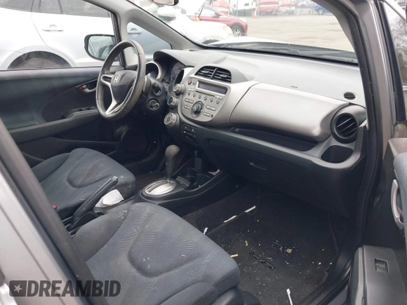 2009 Honda Fit Sport with VIN JHMGE88429S059170, listed as a IAAI auction lot 42091260 with 135,822 mi miles. Bid and sale history available at carsss.com. Image 5.