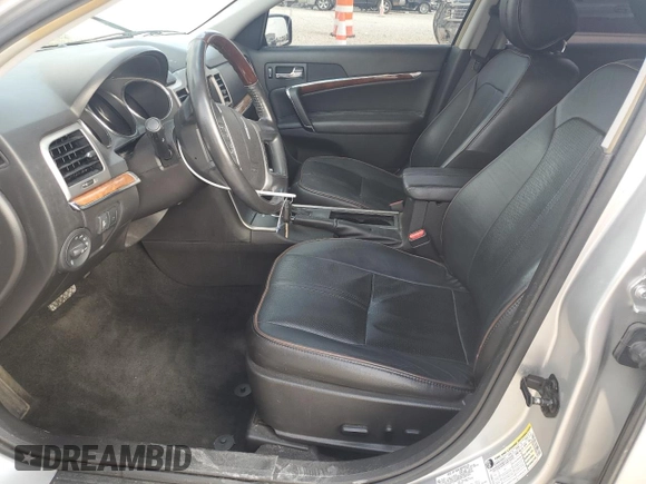 2012 Lincoln MKZ with VIN 3LNHL2GC0CR837207, listed as a Copart auction lot 49104345 with 121,647 mi miles and Salvage Title. Bid and sale history available at DreamBid. Image 7.