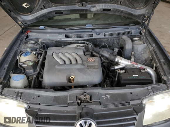 1999 Volkswagen Jetta GL z VIN 3VWRA29M7XM058584, wystawiony jako Copart lot #83714754 z przebiegiem 398 647 mil mil oraz Szkoda całkowita • Salvage title. Historia ofert i sprzedaży dostępna na DreamBid. Obrazek 11.