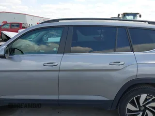 2024 Volkswagen Atlas SE z VIN 1V2WR2CA3RC567572, wystawiony jako IAAI lot #42042562 z przebiegiem 28 684 mil mil oraz . Historia ofert i sprzedaży dostępna na DreamBid. Obrazek 14.
