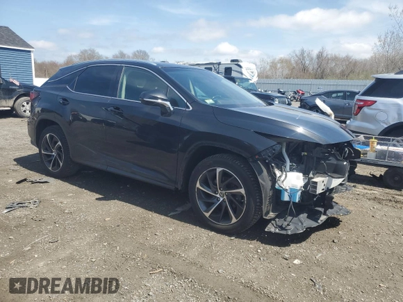 2018 Lexus RX 350 z VIN 2T2BZMCA8JC165954, wystawiony jako Copart lot #54001415 z przebiegiem 79 758 mil mil oraz Szkoda całkowita • Salvage title. Historia ofert i sprzedaży dostępna na DreamBid. Obrazek 4.