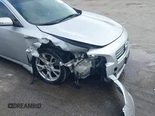 2014 Nissan Maxima S with VIN 1N4AA5AP3EC498006, listed as a IAAI auction lot 42114320 with 162,451 mi miles and . Bid and sale history available at DreamBid. Image 6.