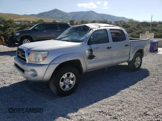 2010 Toyota Tacoma PreRunner with VIN 3TMJU4GN8AM095133, listed as a Copart auction lot 59602955 with 146,136 mi miles and Salvage title. Bid and sale history available at DreamBid. Image 1.