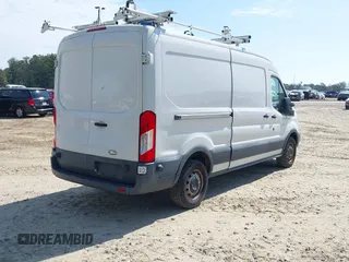 2015 Ford Transit Cargo z VIN 1FTNE2CM6FKA08103, wystawiony jako IAAI lot #42137844 z przebiegiem 224 687 mil mil oraz . Historia ofert i sprzedaży dostępna na DreamBid. Obrazek 4.