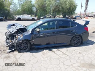 2016 Subaru WRX STI with VIN JF1VA2M65G9824049, listed as a IAAI auction lot 42517527 with 117,883 mi miles and . Bid and sale history available at DreamBid. Image 13.
