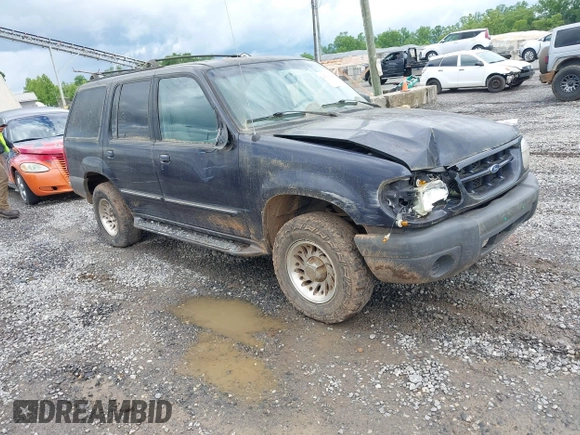 1999 Ford Explorer XL z VIN 1FMDU34X5XUC08663, wystawiony jako IAAI lot #42385444 z przebiegiem 177 387 mil mil oraz . Historia ofert i sprzedaży dostępna na DreamBid. Obrazek 1.