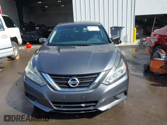 2016 Nissan Altima SV with VIN 1N4AL3AP5GC166005, listed as a IAAI auction lot 41795548 with 111,942 mi miles and . Bid and sale history available at DreamBid. Image 12.