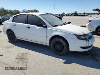 2003 Saturn ION ION 1 z VIN 1G8AF52F83Z151812, wystawiony jako Copart lot #77000594 z przebiegiem 313 620 mil mil oraz Szkoda całkowita • Salvage title. Historia ofert i sprzedaży dostępna na DreamBid. Obrazek 4.