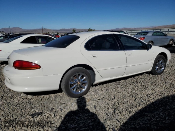 2001 Chrysler LHS z VIN 2C3AC56GX1H547856, wystawiony jako Copart lot #77842124 z przebiegiem 97 378 mil mil oraz Tytuł czysty. Historia ofert i sprzedaży dostępna na DreamBid. Obrazek 3.