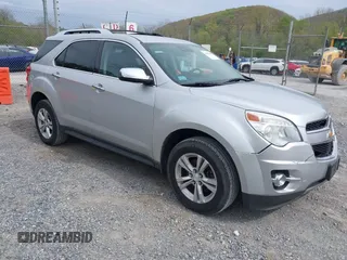 2013 Chevrolet Equinox LTZ z VIN 2GNFLGEK3D6165128, wystawiony jako IAAI lot #42085881 z przebiegiem 120 989 mil mil oraz . Historia ofert i sprzedaży dostępna na DreamBid. Obrazek 1.