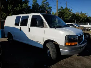 2003 GMC Savana Cargo Van with VIN 1GTGG25U031121692, listed as a Copart auction lot 70495844 with 57,614 mi miles and Salvage Title. Bid and sale history available at carsss.com. Image 4.