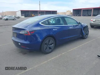 2018 Tesla Model 3 Long Range Battery z VIN 5YJ3E1EA6JF160859, wystawiony jako IAAI lot #42149636 z przebiegiem 81 159 mil mil oraz . Historia ofert i sprzedaży dostępna na DreamBid. Obrazek 4.