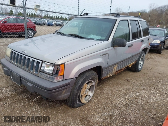 1995 Jeep Grand Cherokee Laredo with VIN 1J4GZ58S4SC532578, listed as a IAAI auction lot 41936041 with 161,777 mi miles. Bid and sale history available at carsss.com. Image 2.