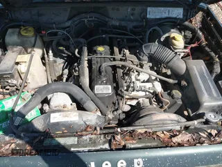 1996 Jeep Cherokee z VIN 1J4FT27S2TL147793, wystawiony jako IAAI lot #41568265 z przebiegiem 223 742 mil mil oraz . Historia ofert i sprzedaży dostępna na DreamBid. Obrazek 10.