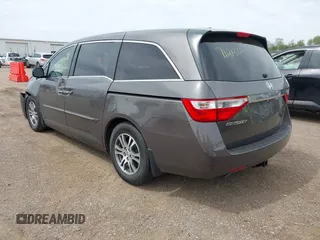 2011 Honda Odyssey EX-L with VIN 5FNRL5H68BB100274, listed as a IAAI auction lot 42159787 with 205,616 mi miles and . Bid and sale history available at carsss.com. Image 3.