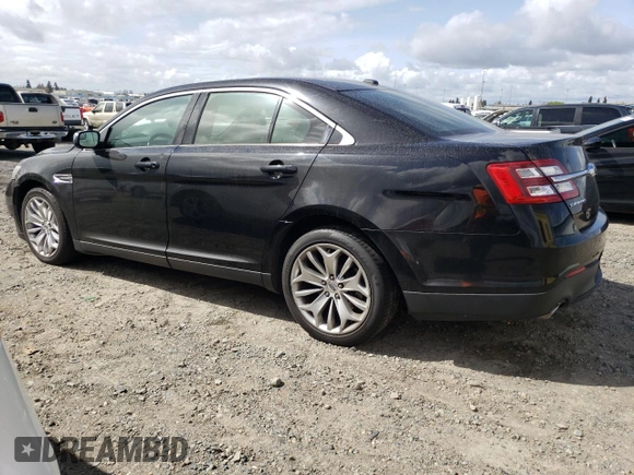 2016 Ford Taurus Limited with VIN 1FAHP2F82GG111485, listed as a Copart auction lot 50736735 with 135,618 mi miles and Salvage Title. Bid and sale history available at DreamBid. Image 2.