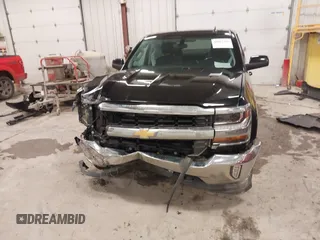 2016 Chevrolet Silverado 1500 LT with VIN 1GCVKREC5GZ176474, listed as a IAAI auction lot 41983780 with 118,587 mi miles and . Bid and sale history available at DreamBid. Image 6.