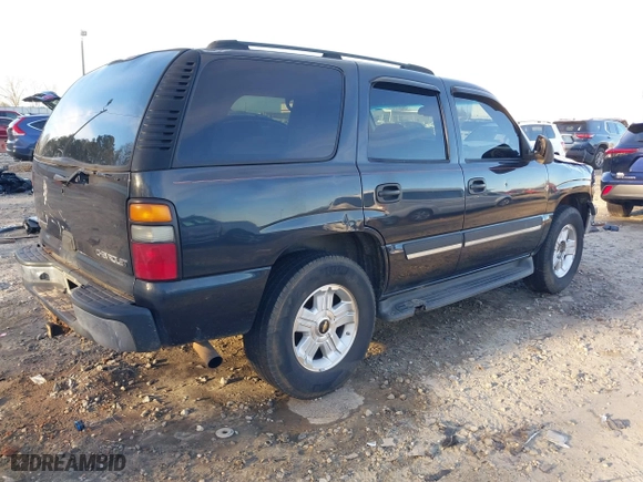 2005 Chevrolet Tahoe LS with VIN 1GNEK13T75J126912, listed as a IAAI auction lot 41370116 with 242,937 mi miles. Bid and sale history available at carsss.com. Image 4.