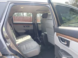 2021 Honda CR-V EX with VIN 2HKRW1H59MH404256, listed as a IAAI auction lot 41711235 with 100,389 mi miles. Bid and sale history available at carsss.com. Image 8.
