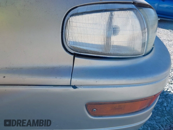 1994 Toyota Camry LE with VIN 4T1SK12E9RU351895, listed as a IAAI auction lot 41239573 with 184,866 mi miles. Bid and sale history available at carsss.com. Image 12.