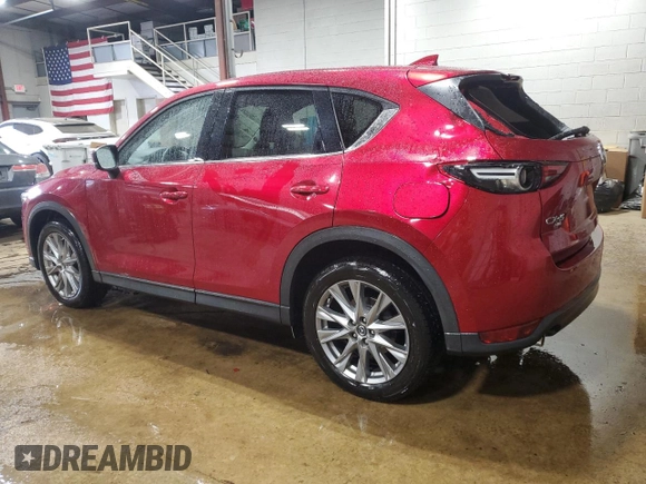 2020 Mazda CX-5 Grand Touring with VIN JM3KFBDM2L1771632, listed as a Copart auction lot 52894945 with 34,926 mi miles and Salvage Title. Bid and sale history available at carsss.com. Image 2.