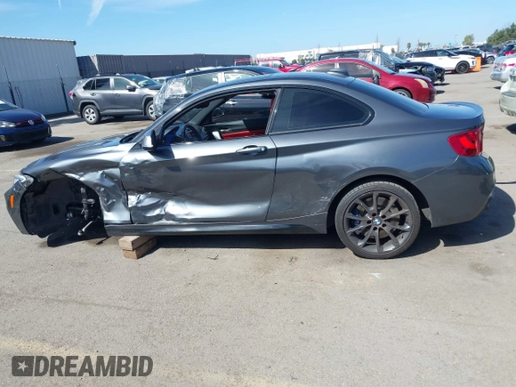 2014 BMW 2 Series M235i with VIN WBA1J7C51EVX33702, listed as a IAAI auction lot 41713337 with 83,076 mi miles. Bid and sale history available at carsss.com. Image 15.