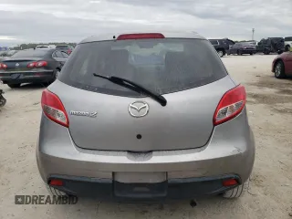 2012 Mazda 2 Sport with VIN JM1DE1KY1C0140803, listed as a Copart auction lot 83420714 with 153,730 mi miles and Salvage Title. Bid and sale history available at DreamBid. Image 6.