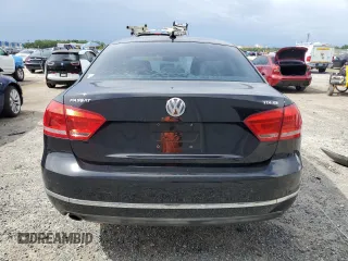 2014 Volkswagen Passat SE with VIN 1VWBN7A35EC094262, listed as a Copart auction lot 60287965 with 71,081 mi miles and Salvage title. Bid and sale history available at DreamBid. Image 6.