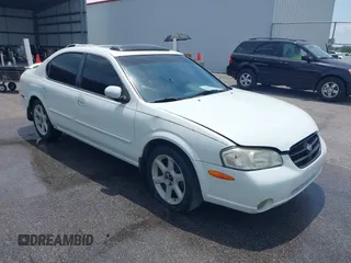 2000 Nissan Maxima GXE z VIN JN1CA31D6YT542083, wystawiony jako IAAI lot #42306685 z przebiegiem 296 613 mil mil oraz . Historia ofert i sprzedaży dostępna na DreamBid. Obrazek 1.