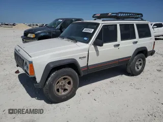 1996 Jeep Cherokee Sport with VIN 1J4FJ68S1TL128597, listed as a Copart auction lot 49600545 with 201,074 mi miles and Salvage title. Bid and sale history available at DreamBid. Image 1.