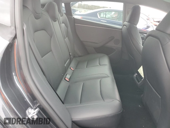 2025 Tesla Model 3 Long Range with VIN 5YJ3E1EA5SF889727, listed as a Copart auction lot 49207545 with 6,980 mi miles and Salvage Title. Bid and sale history available at carsss.com. Image 10.