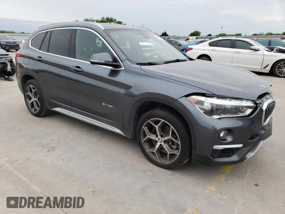 2017 BMW X1 sDrive28i with VIN WBXHU7C35H5H35194, listed as a Copart auction lot 47400983 with 80,312 mi miles and . Bid and sale history available at DreamBid. Image 4.