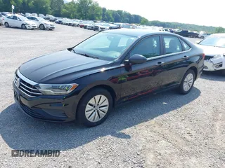 2019 Volkswagen Jetta S z VIN 3VWC57BU6KM084104, wystawiony jako IAAI lot #42423409 z przebiegiem 115 398 mil mil oraz . Historia ofert i sprzedaży dostępna na DreamBid. Obrazek 2.