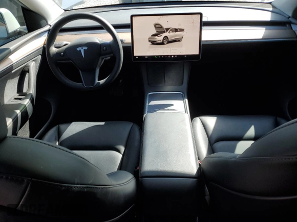 2023 Tesla Model Y Long Range z VIN 7SAYGDEE7PF788932, wystawiony jako Copart lot #52822515 z przebiegiem 33 007 mil mil oraz Szkoda całkowita • Salvage title. Historia ofert i sprzedaży dostępna na DreamBid. Obrazek 8.