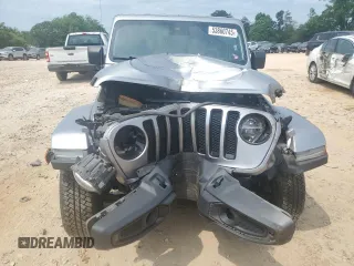 2020 Jeep Wrangler Unlimited Sahara Altitude with VIN 1C4HJXEN7LW134325, listed as a Copart auction lot 53860745 with 64,556 mi miles and Salvage title. Bid and sale history available at DreamBid. Image 5.